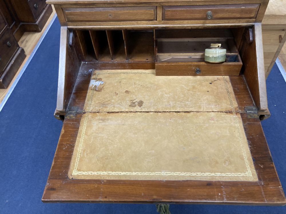 A walnut bureau de dame, width 65cm depth 46cm height 97cm